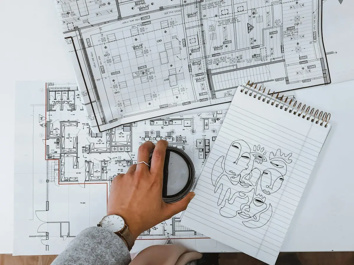 Hands over architectural plans
