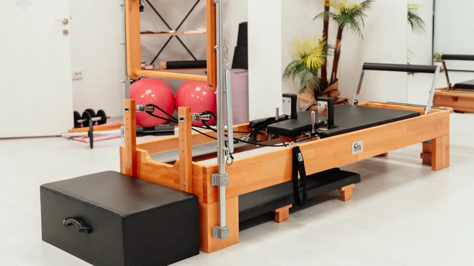 Reformer machines in a bright studio